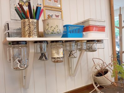 shelf with containers for screws