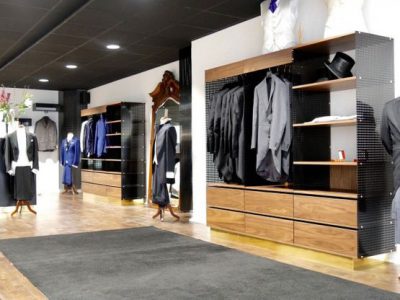 frack and formal clothing displayed in the store